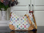 Louis Vuitton multicolor monogram handbag with tan leather handles and gold hardware