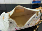 Louis Vuitton monogram bag interior with tan lining and zip-top opening