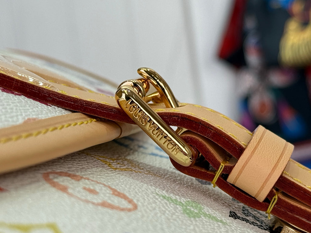 Louis Vuitton gold-tone clasp with leather strap and logo on multicolor canvas