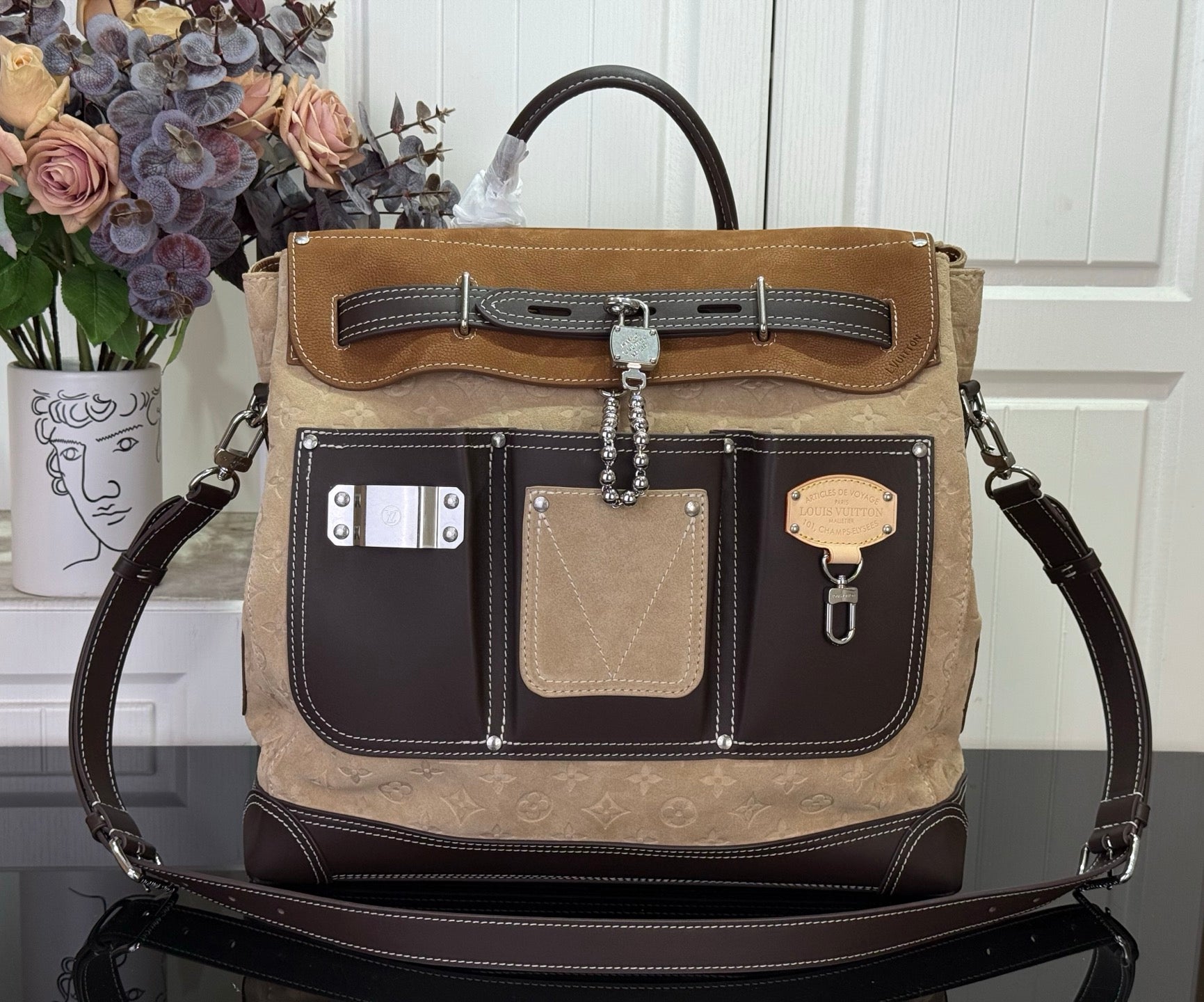 Louis Vuitton canvas handbag in tan with dark brown trim, top handles and dual straps