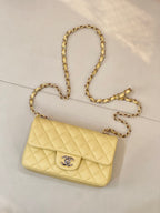 Chanel quilted shoulder bag with gold chain strap and flap logo clasp