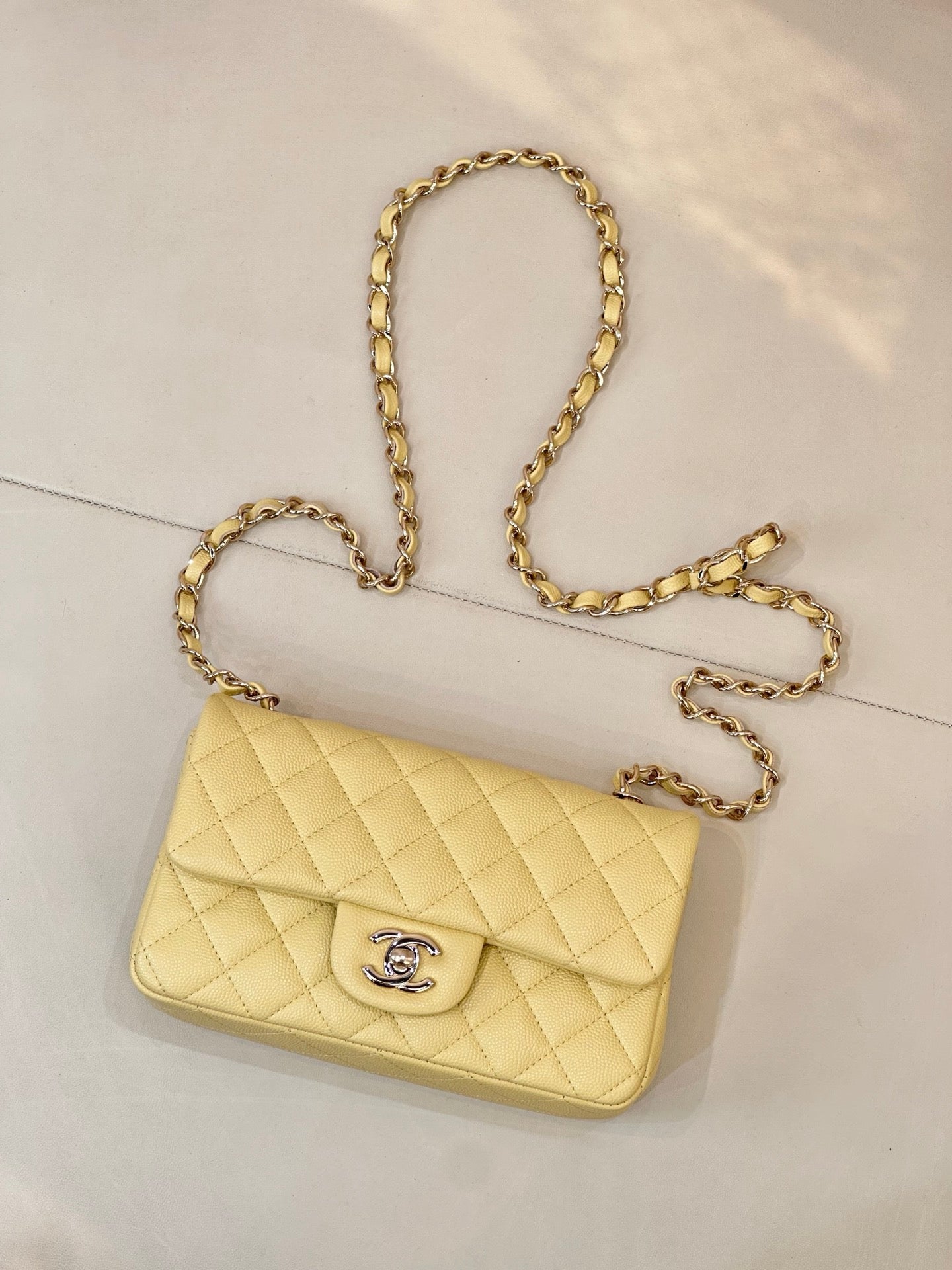 Chanel quilted shoulder bag with gold chain strap and flap logo clasp
