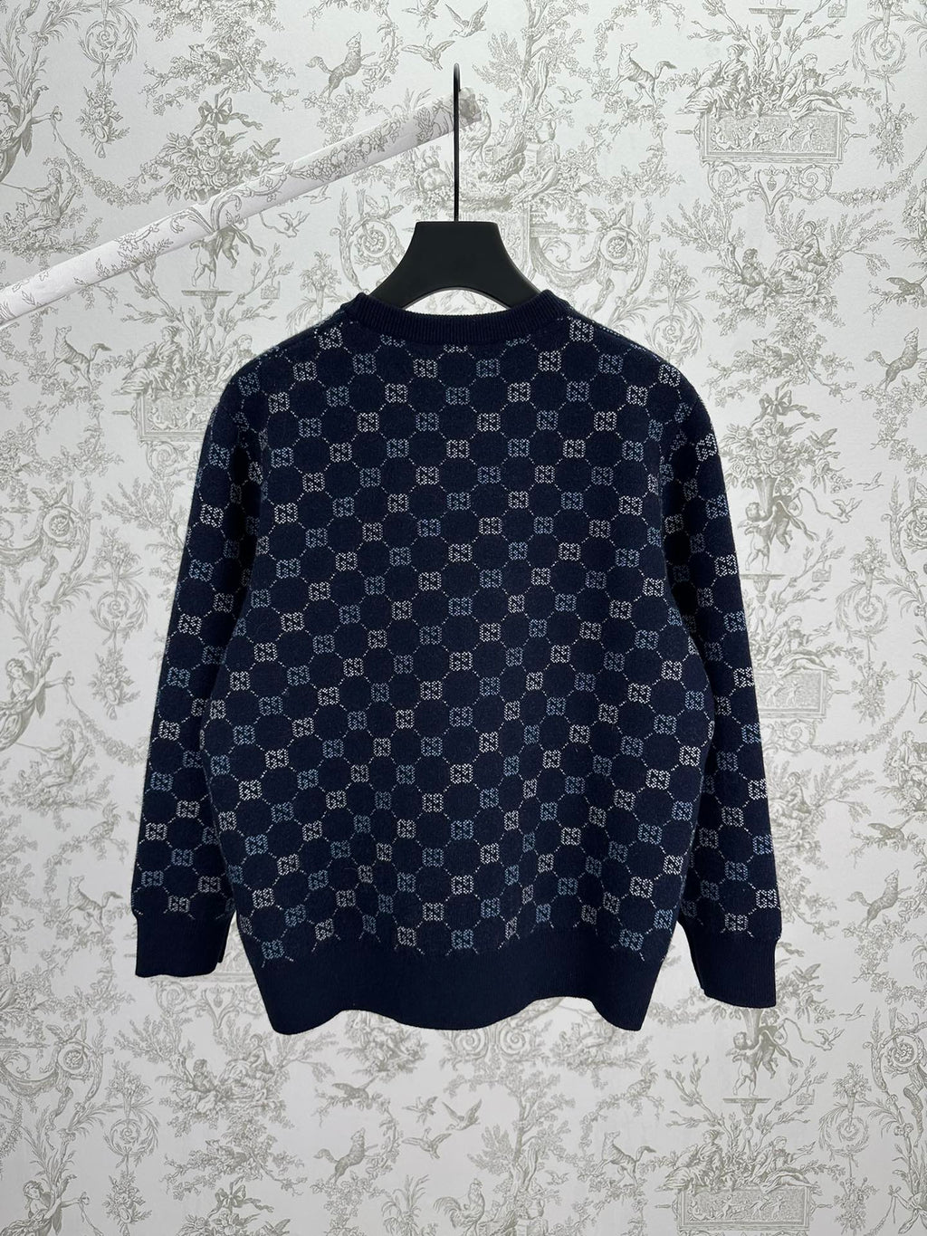 Navy long-sleeve sweater featuring an allover GG monogram knit pattern