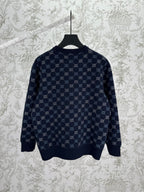 Navy long-sleeve sweater featuring an allover GG monogram knit pattern