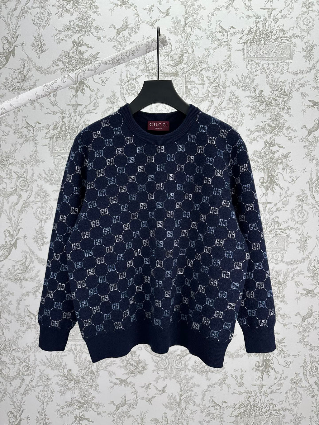 Navy long-sleeve knit sweater with allover GG monogram pattern and ribbed hem