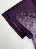 Purple T-shirt hem and sleeve edge detail, folded
