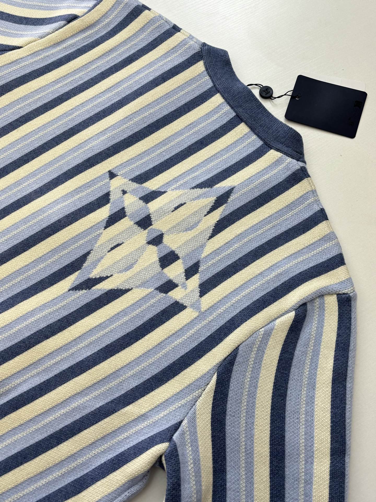 Louis Vuitton striped cardigan collar and chest diamond motif in blue and cream
