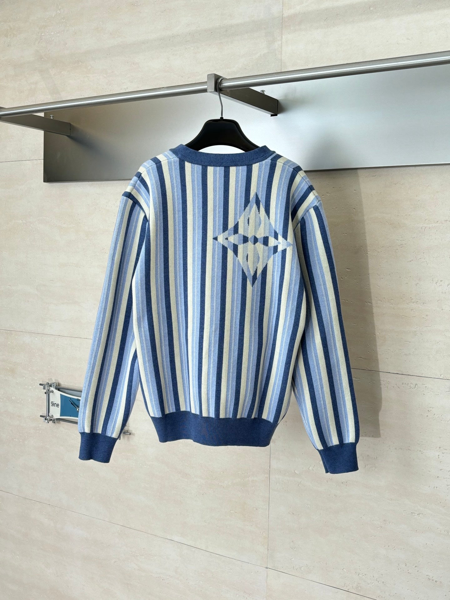 Louis Vuitton striped cardigan sweater, blue and cream knit with diamond motif on back