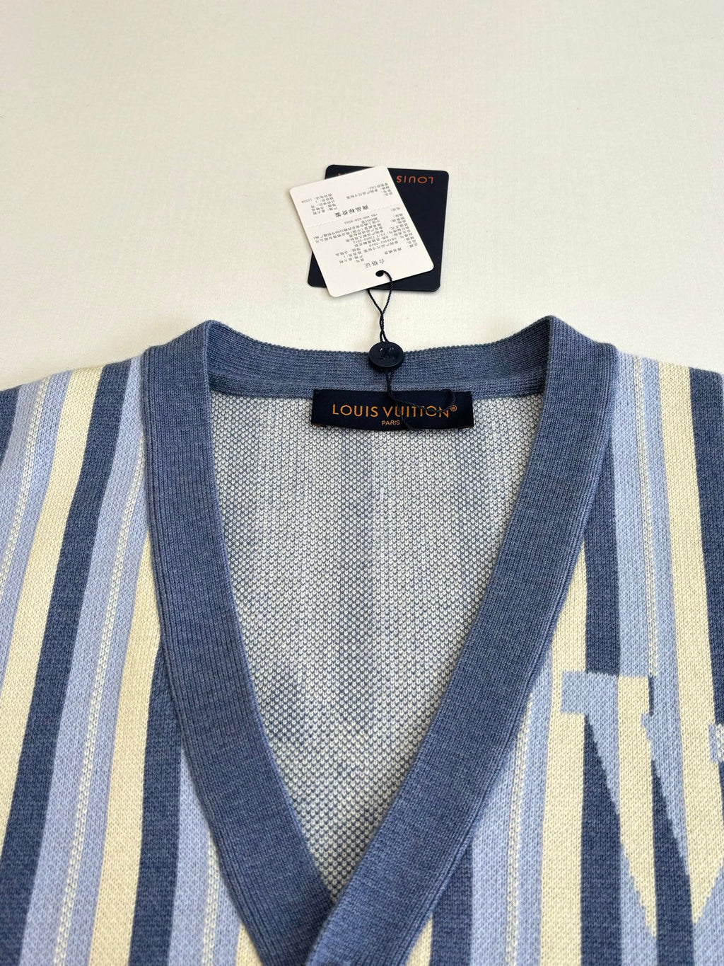 Louis Vuitton V-neck cardigan knit with striped pattern and Louis Vuitton neck label
