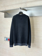 Dark navy long-sleeve sweater back view with ribbed hem and cuffs