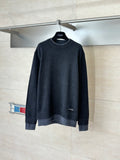 Dark navy long-sleeve sweater with ribbed crew neck and cuffs