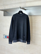Dark navy long-sleeve sweater with ribbed crew neck and cuffs