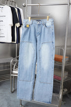 Light blue denim pants with patch pockets and belt loops