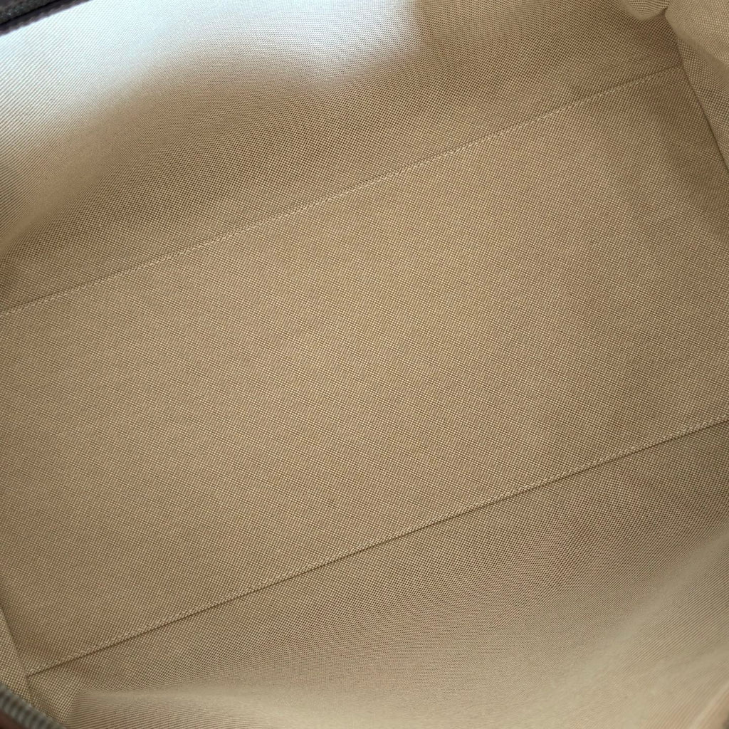 Duffel bag interior lining in light beige fabric