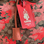 Gucci duffel bag red leather luggage tag with Firenze 1921 stamp