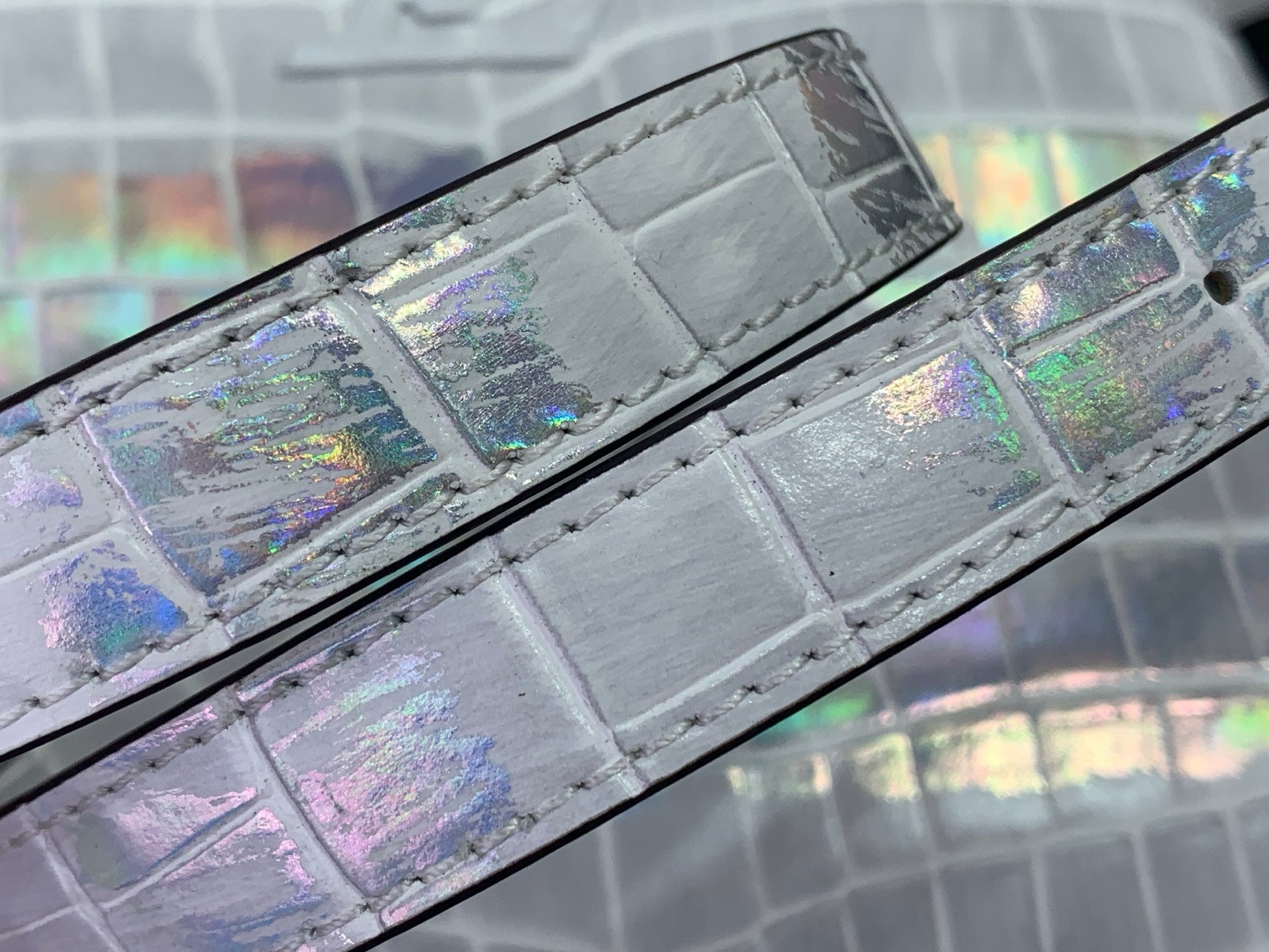 Louis Vuitton croc-embossed leather strap in iridescent white with holographic sheen