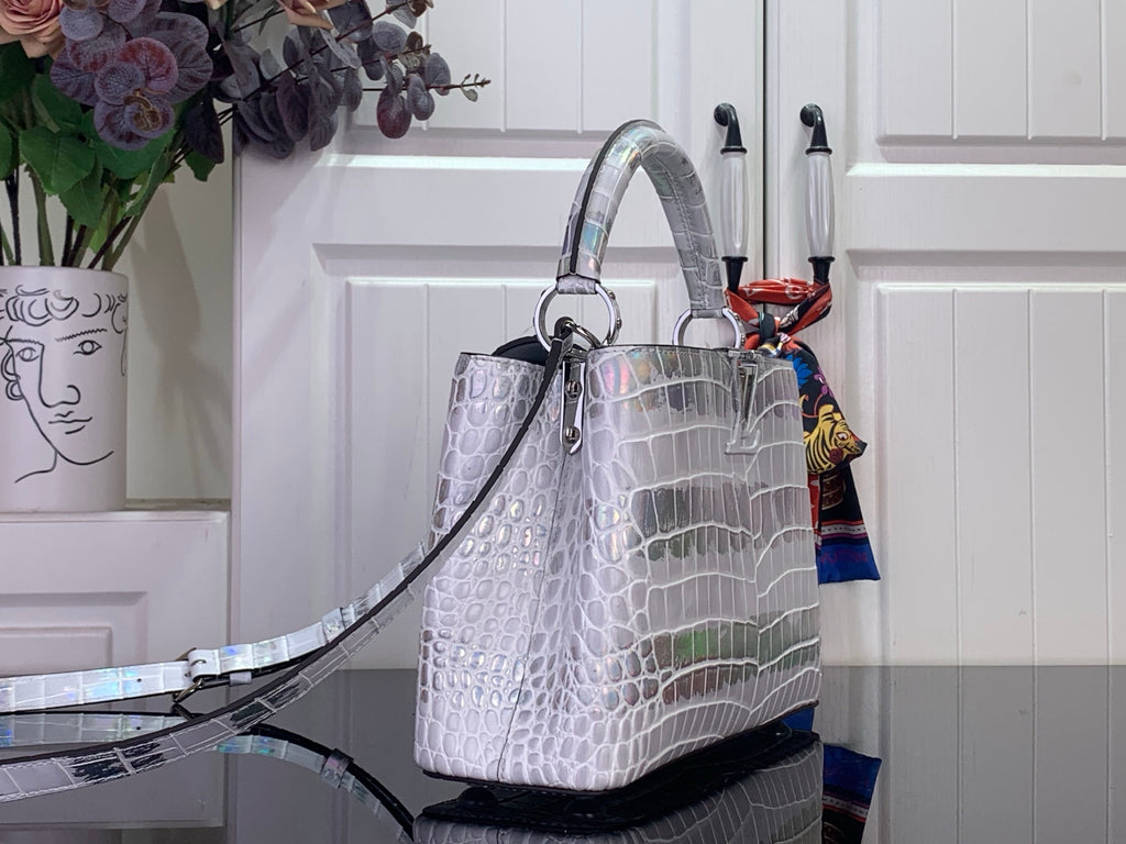 Louis Vuitton top-handle handbag with long strap, iridescent white croc-embossed leather