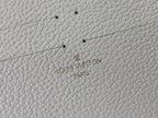 Louis Vuitton embossed logo text on textured light leather, Paris and VUITTON wording