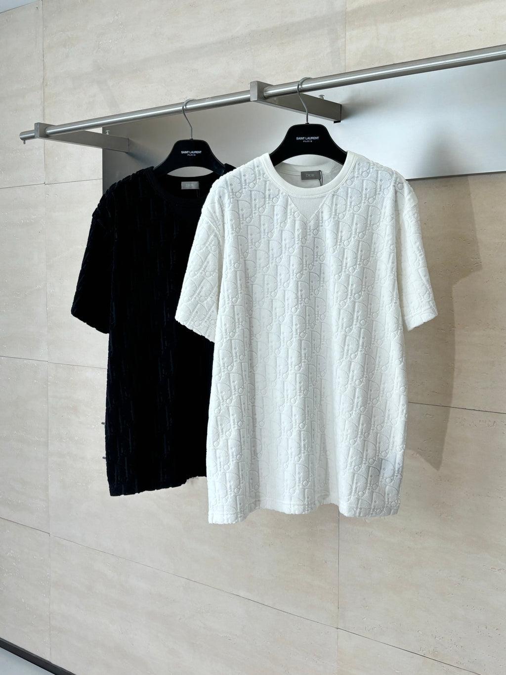 Dior short-sleeve knit tops in white and black, crew neck, raised textured pattern
