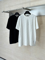 Dior short-sleeve knit tops in white and black, crew neck, raised textured pattern