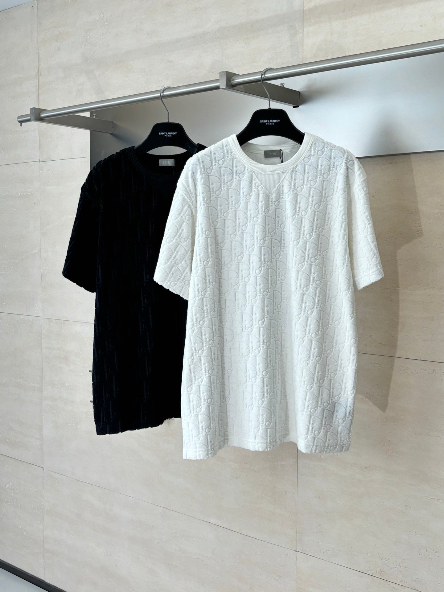 Dior short-sleeve knit tops in white and black, crew neck, raised textured pattern