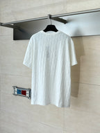 Dior white short-sleeve knit top back view with crew neck and raised textured pattern