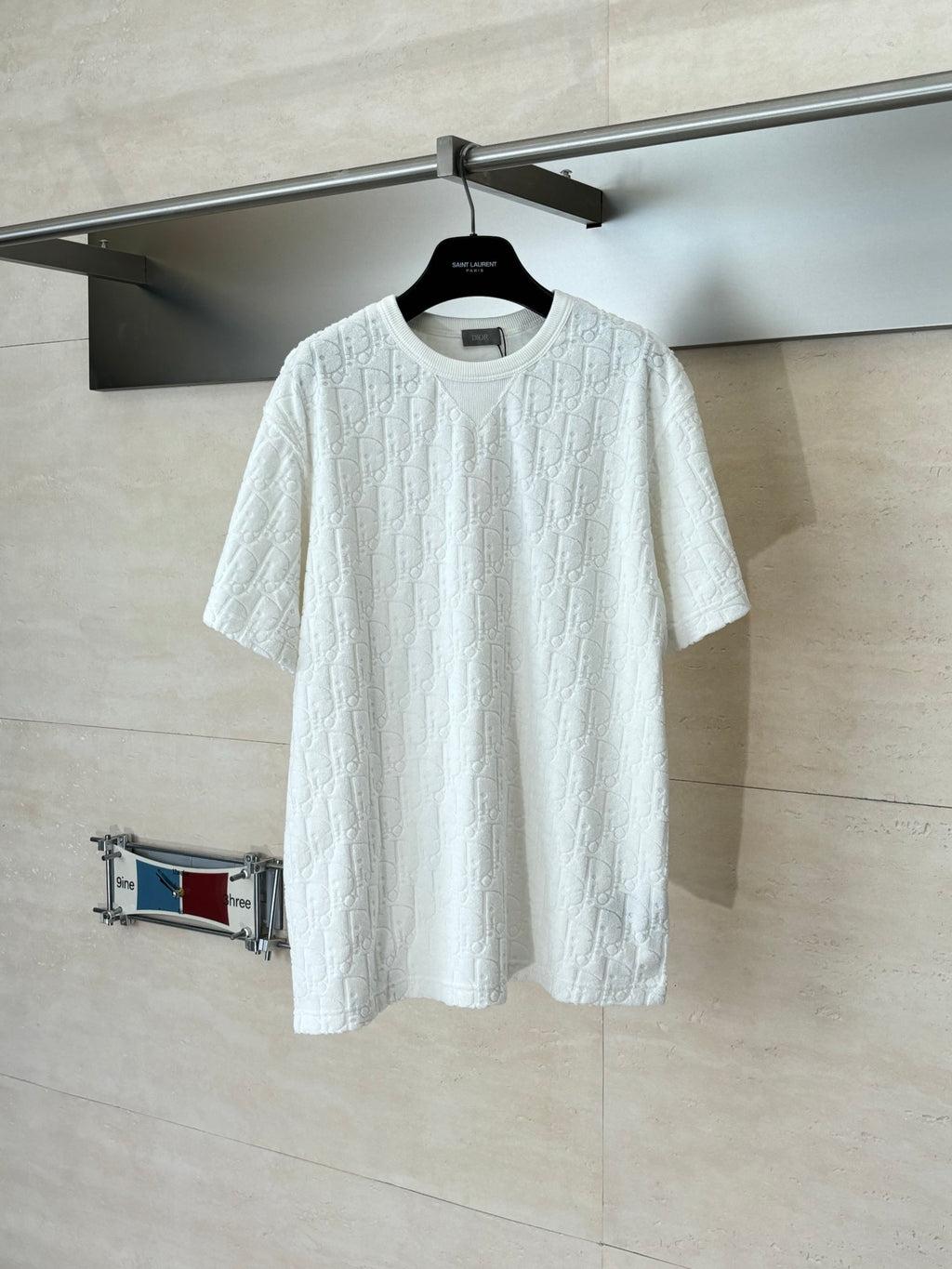 Dior white short-sleeve knit top with crew neck and raised textured pattern