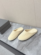 Balenciaga cream slide sandals, front logo panel, slip-on upper