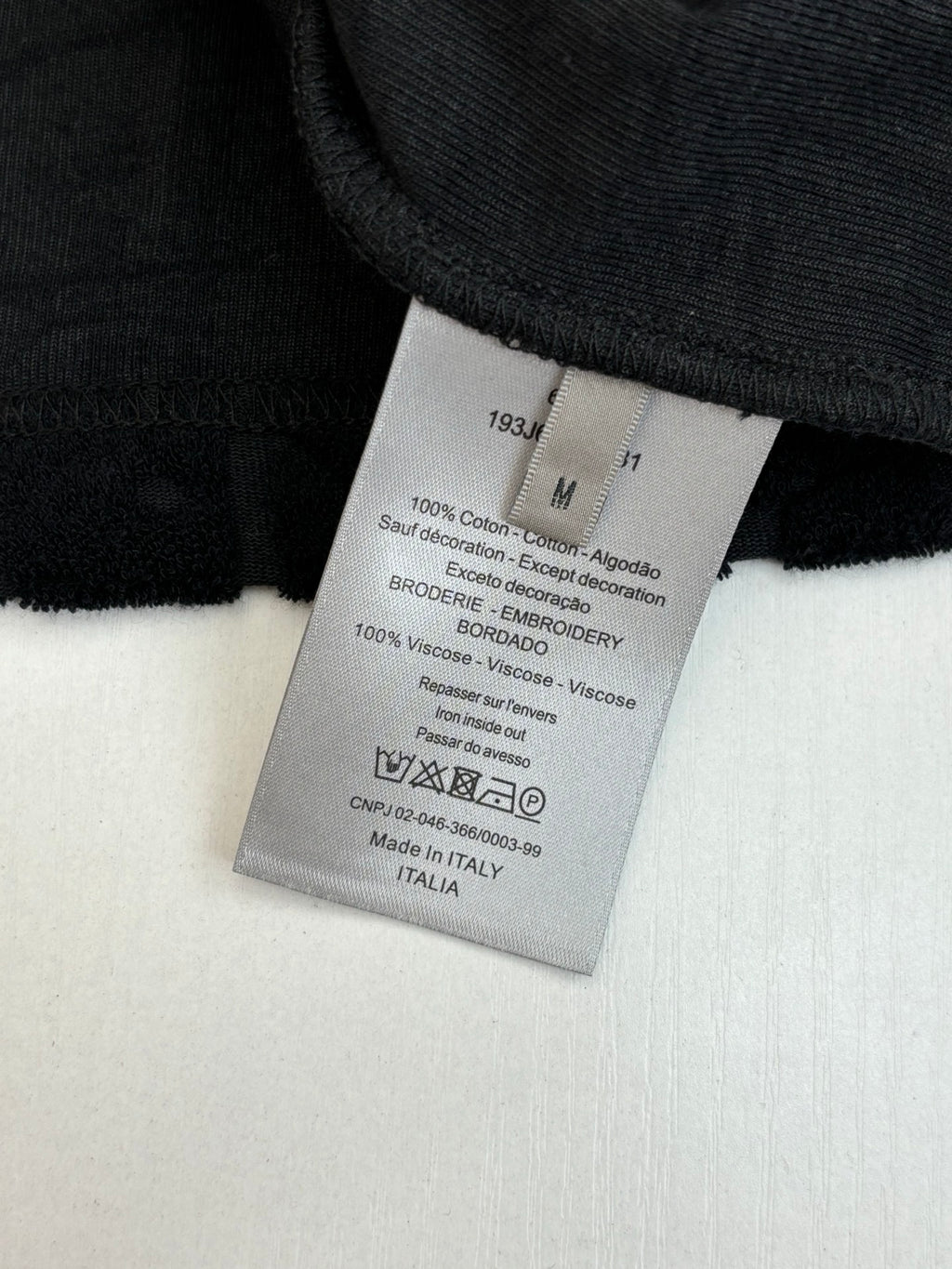 Care label with materials: 100% cotton and 100% viscose; made in Italy