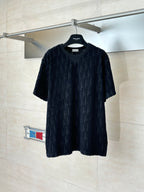 Dior short-sleeve knit top, dark textured fabric with allover logo pattern