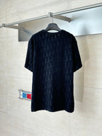Short-sleeve knit top, dark allover logo texture and crew neckline