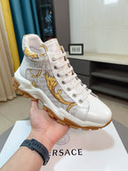 Versace luxury high-top sneakers, white leather with gold emblem and brown sole