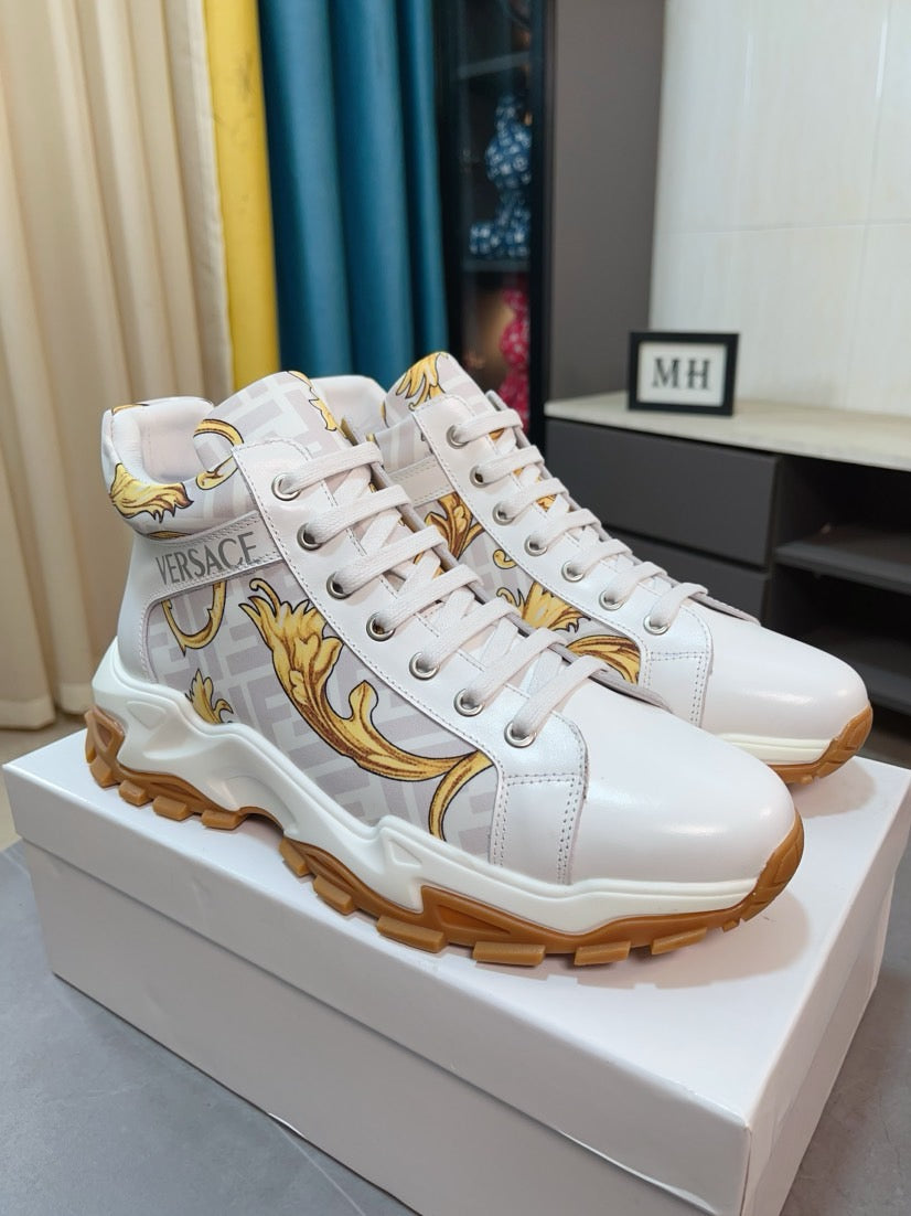 Versace luxury high-top sneakers, white with gold crest detail and tan rubber sole