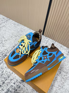 Pair of unisex sneakers, blue uppers with neon yellow laces and star-style cutouts