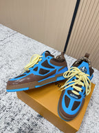 Unisex sneakers with blue panels, dark brown base, and neon yellow lace-up front