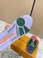 Louis Vuitton sneaker outsole, light purple tread with green geometric accents.