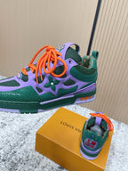 Louis Vuitton unisex sneakers with green sole, purple upper, and orange laces.