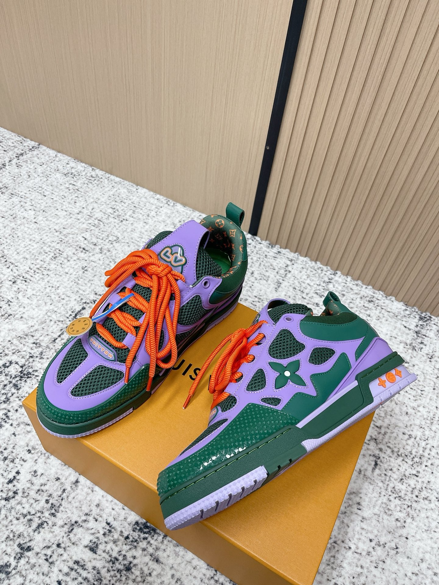Louis Vuitton unisex sneakers, green and purple uppers, orange laces, chunky sole.