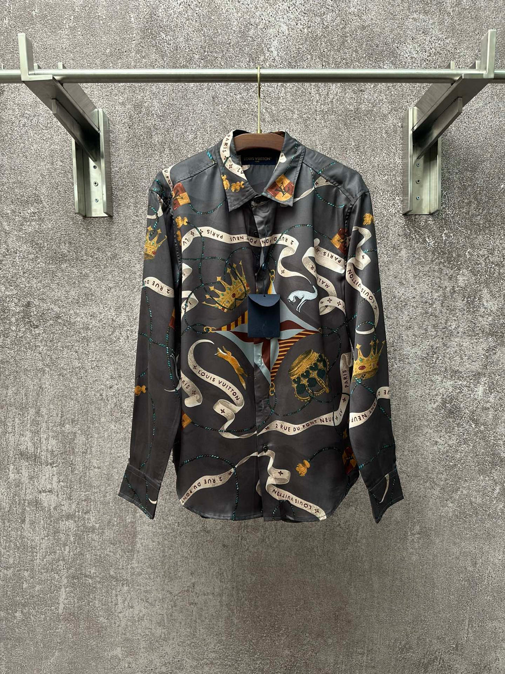 Long-sleeve button-up shirt in dark blue with colorful chain and animal graphic print.