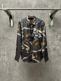 Long-sleeve button-up shirt in dark blue with colorful chain and animal graphic print.