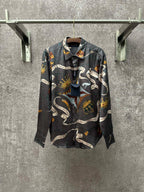 Long-sleeve button-up shirt in dark blue with colorful chain and animal graphic print.