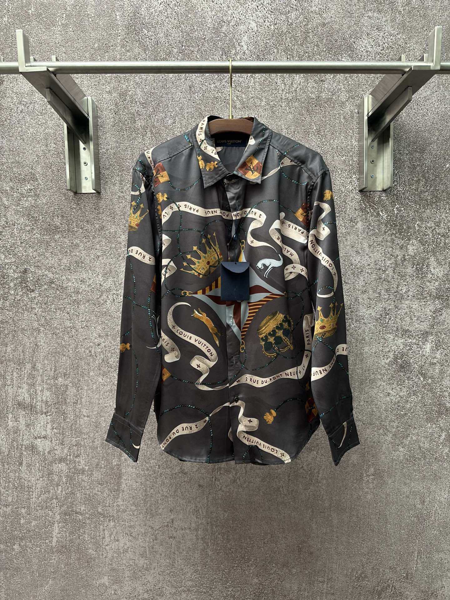 Long-sleeve button-up shirt in dark blue with colorful chain and animal graphic print.