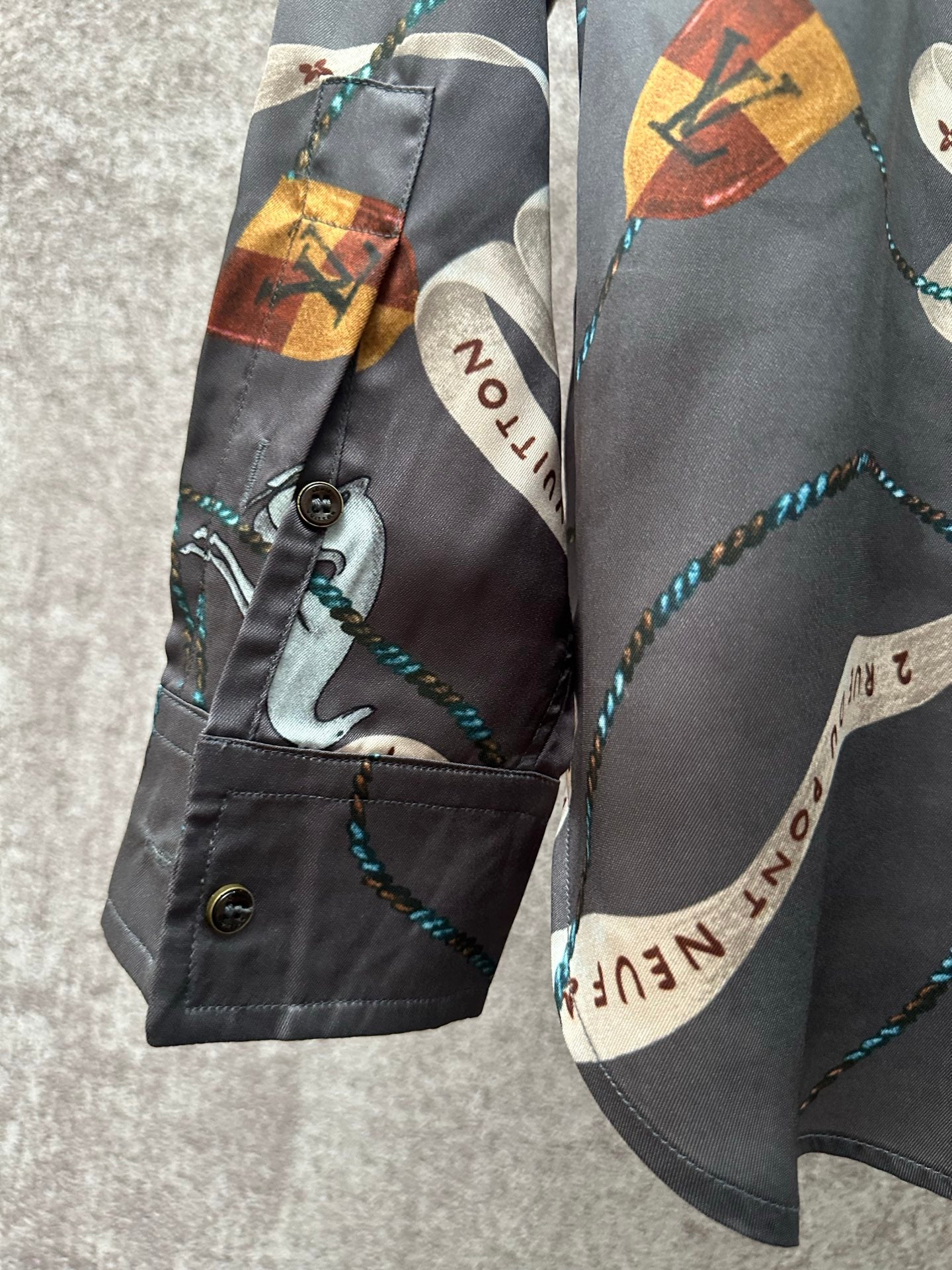 Louis Vuitton long pants in dark gray with colorful graphic print and rope trim, button closure