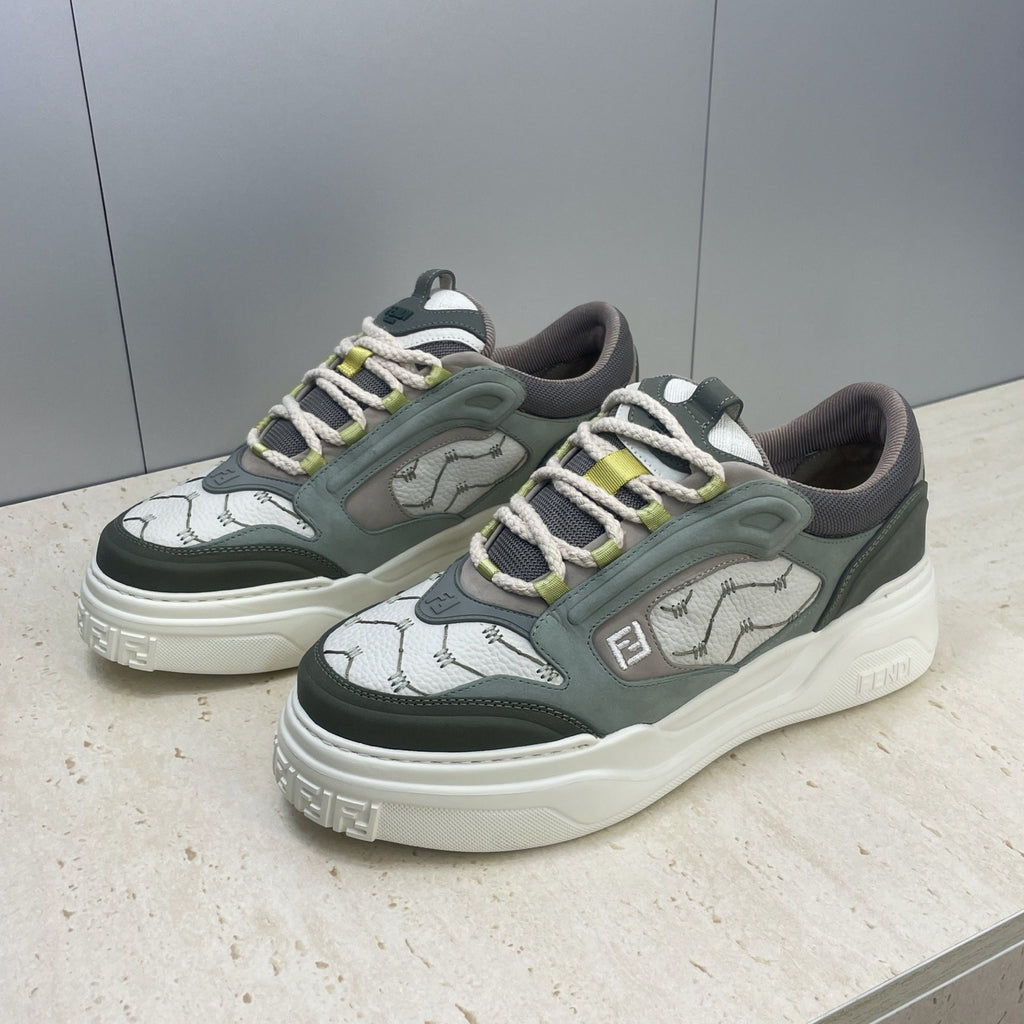 Fendi unisex sneakers, front three-quarter view with patterned toe and lime-green lace trim