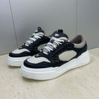 Fendi unisex sneakers in navy and off-white with white laces and oversized white sole