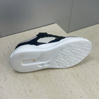 Fendi unisex sneakers outsole view, thick white sole with tread pattern and branding