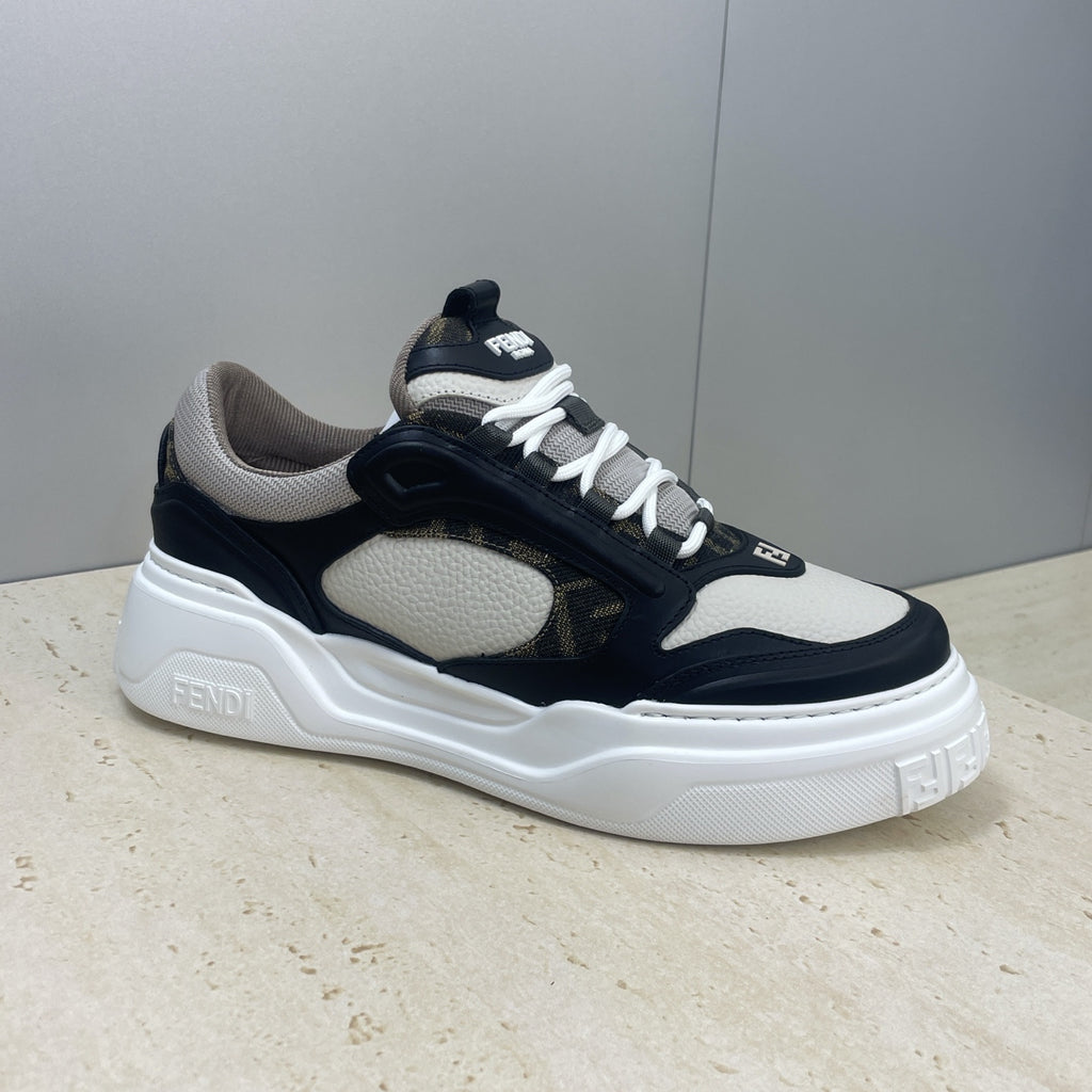 Fendi unisex sneaker profile in navy and off-white with chunky white midsole