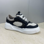 Fendi unisex sneaker profile in navy and off-white with chunky white midsole
