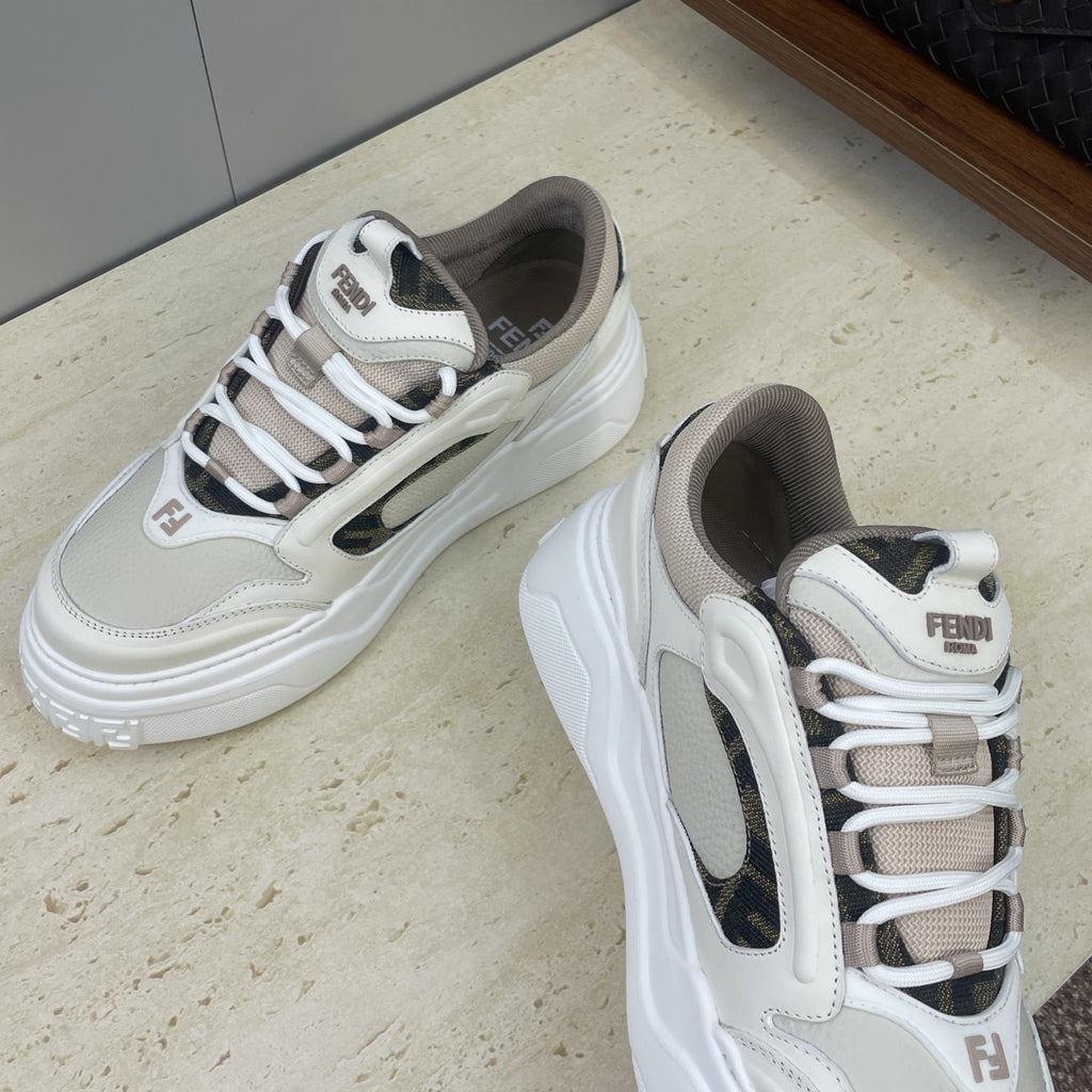 Fendi unisex sneakers shown at angle: white upper, black side detail, lace-up front, thick sole.