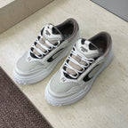 Fendi unisex sneakers, white leather look with dark side panel, lace-up design and chunky sole.